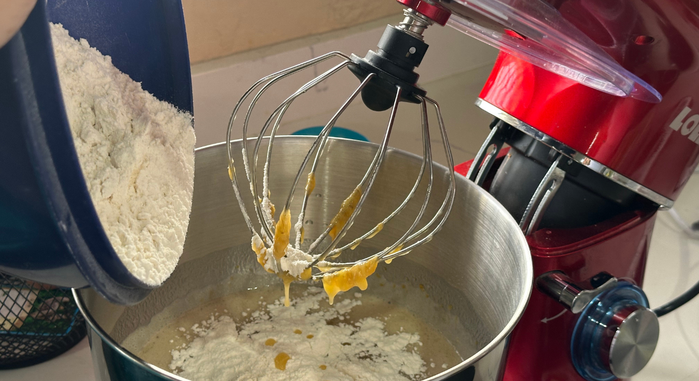 Eggs and flour coming together in the mixer