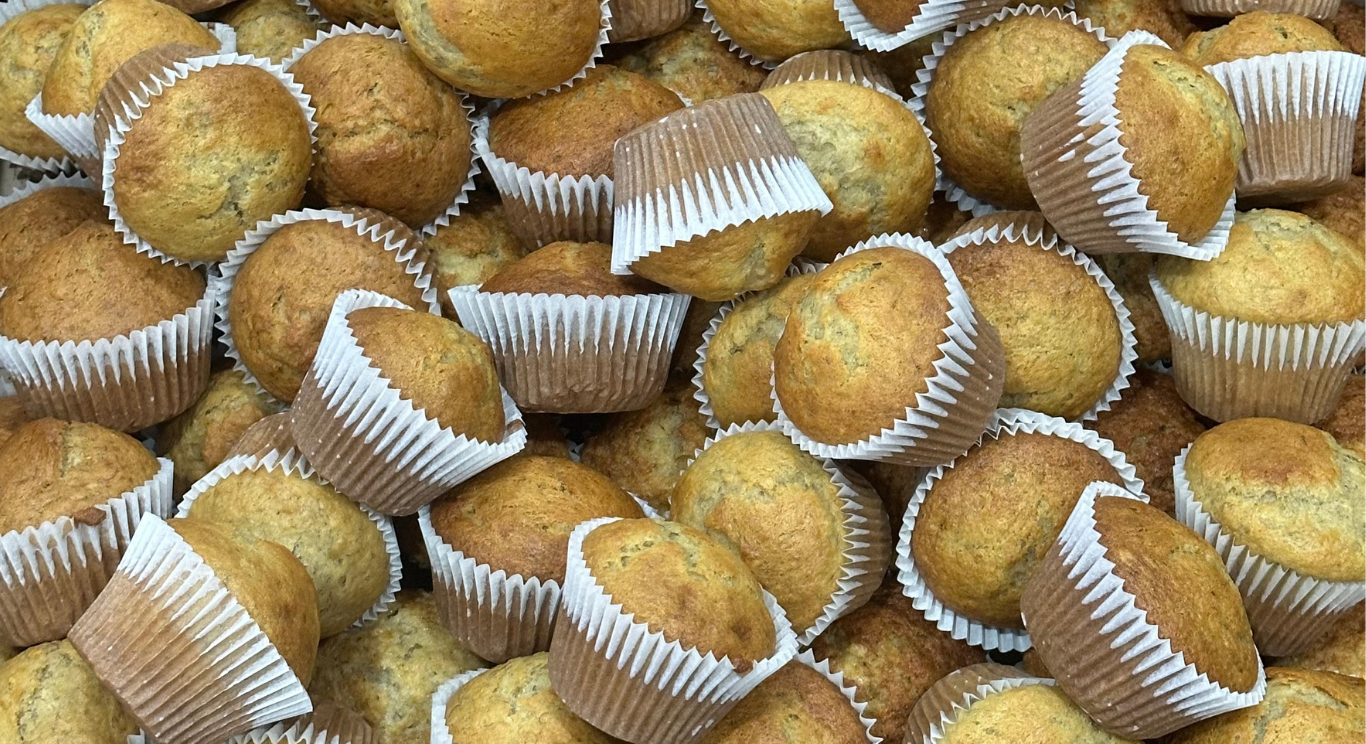A generous pile of freshly baked muffins